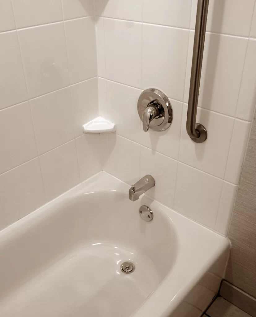 A black and white image of a clean tub